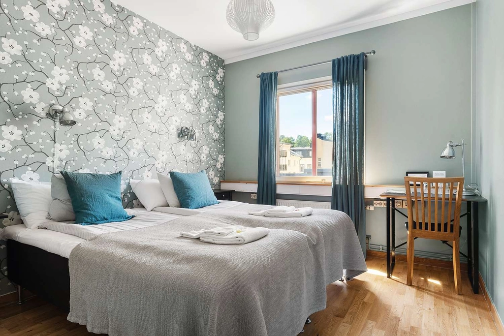 Standard four single beds BW Uppsala
