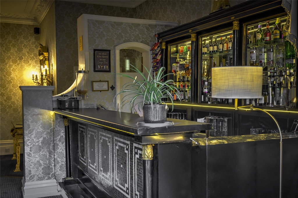 Unwind with a drink at Swiss Cottage's cosy bar