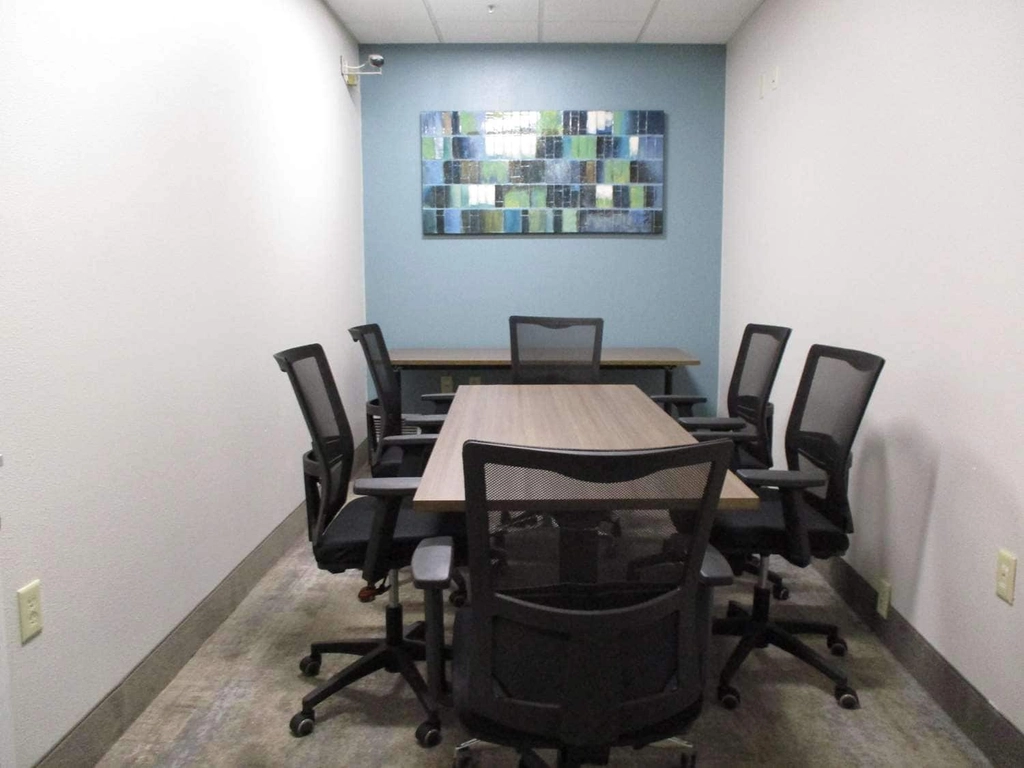 Board Room With Speaker Phone And Seating For 6